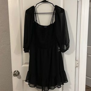 Black dress with sheer off the shoulder sleeves
